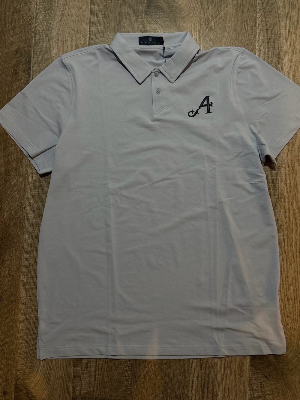 Men's White Extracurricular 2X polo. 4 Aces